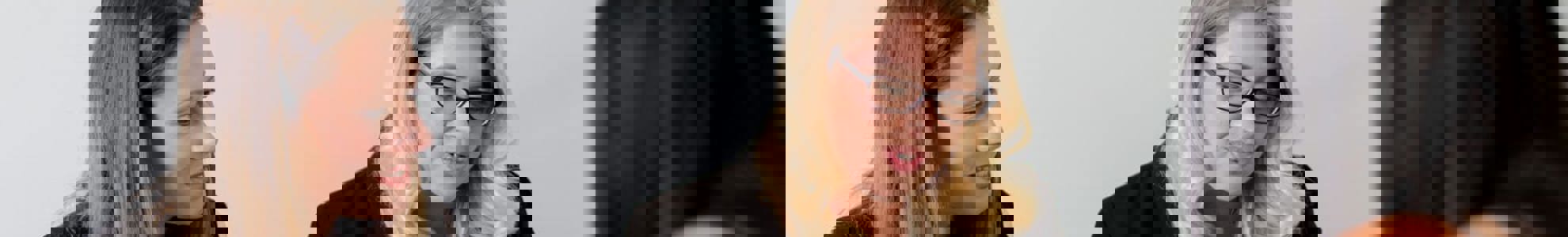 two female advisors talking to client