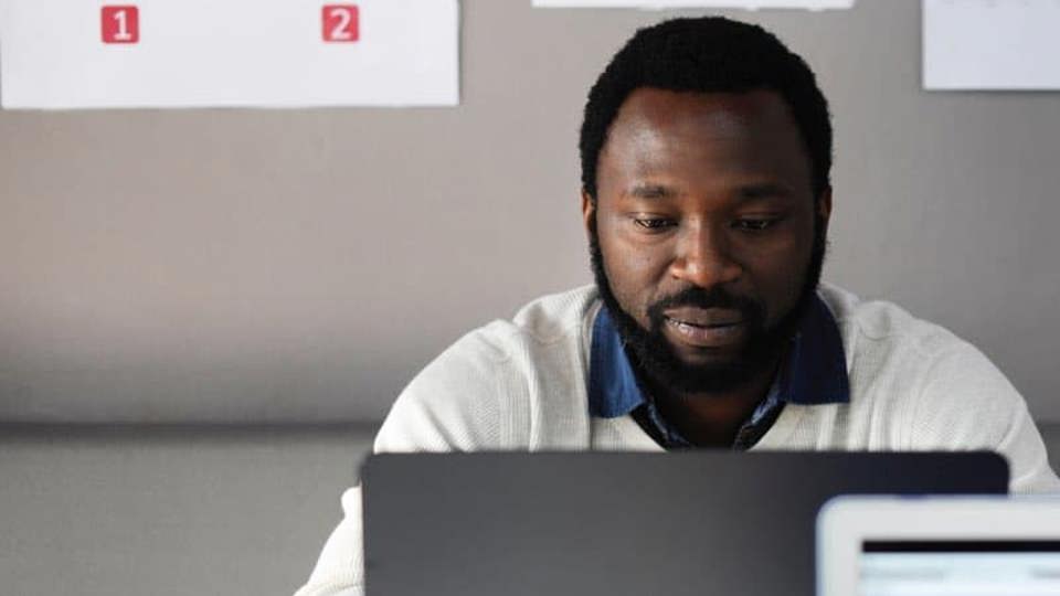 man working on a laptop