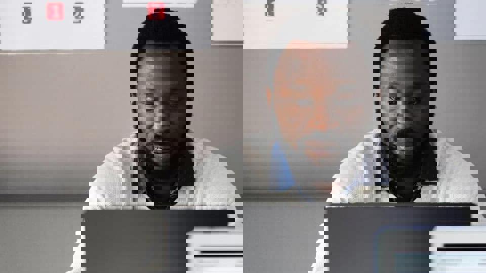 man working on a laptop